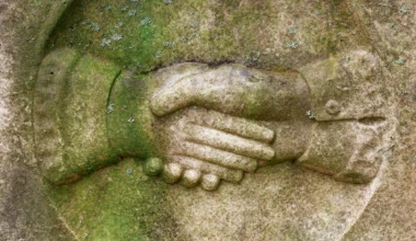 Stockvault tombstone handshake206097